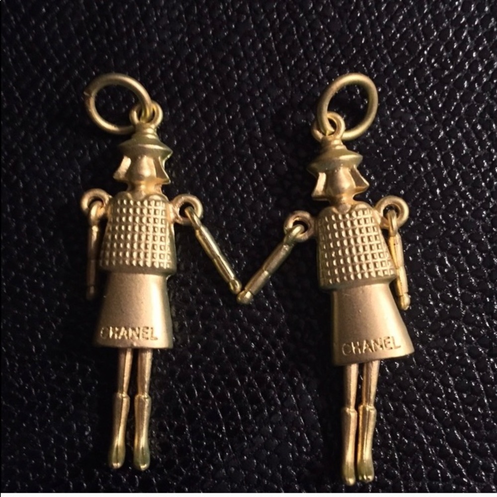 Set of 2 COCO Chanel doll pendants.